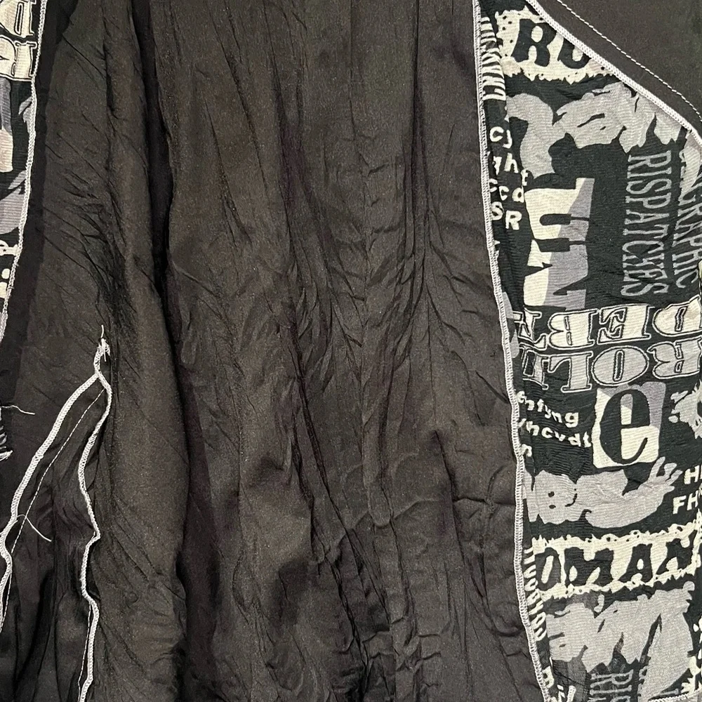 Newspaper dress with black and white patchwork layers - Picture 8 of 10